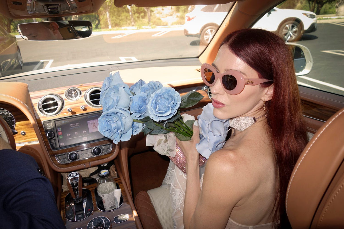 Hermione de Paula bride Madeleine wearing the Monstera Eclipse couture wedding gown with a something blue rose and Celestial Seascape choker - photo 4