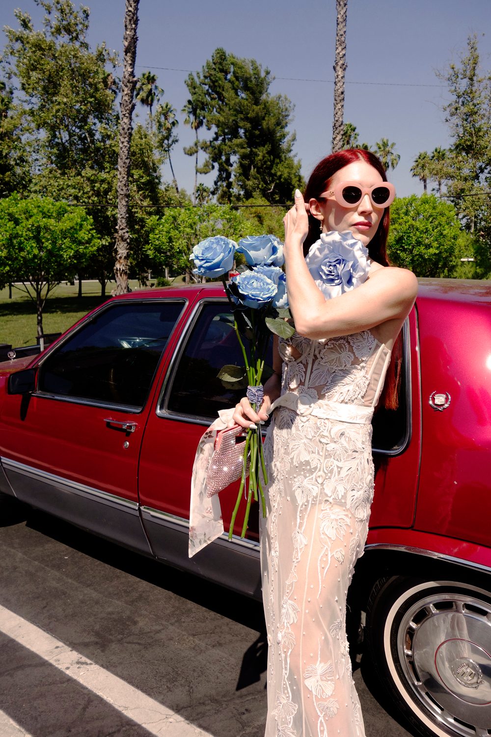 Hermione de Paula bride Madeleine wearing the Monstera Eclipse couture wedding gown with a something blue rose and Celestial Seascape choker - photo 5