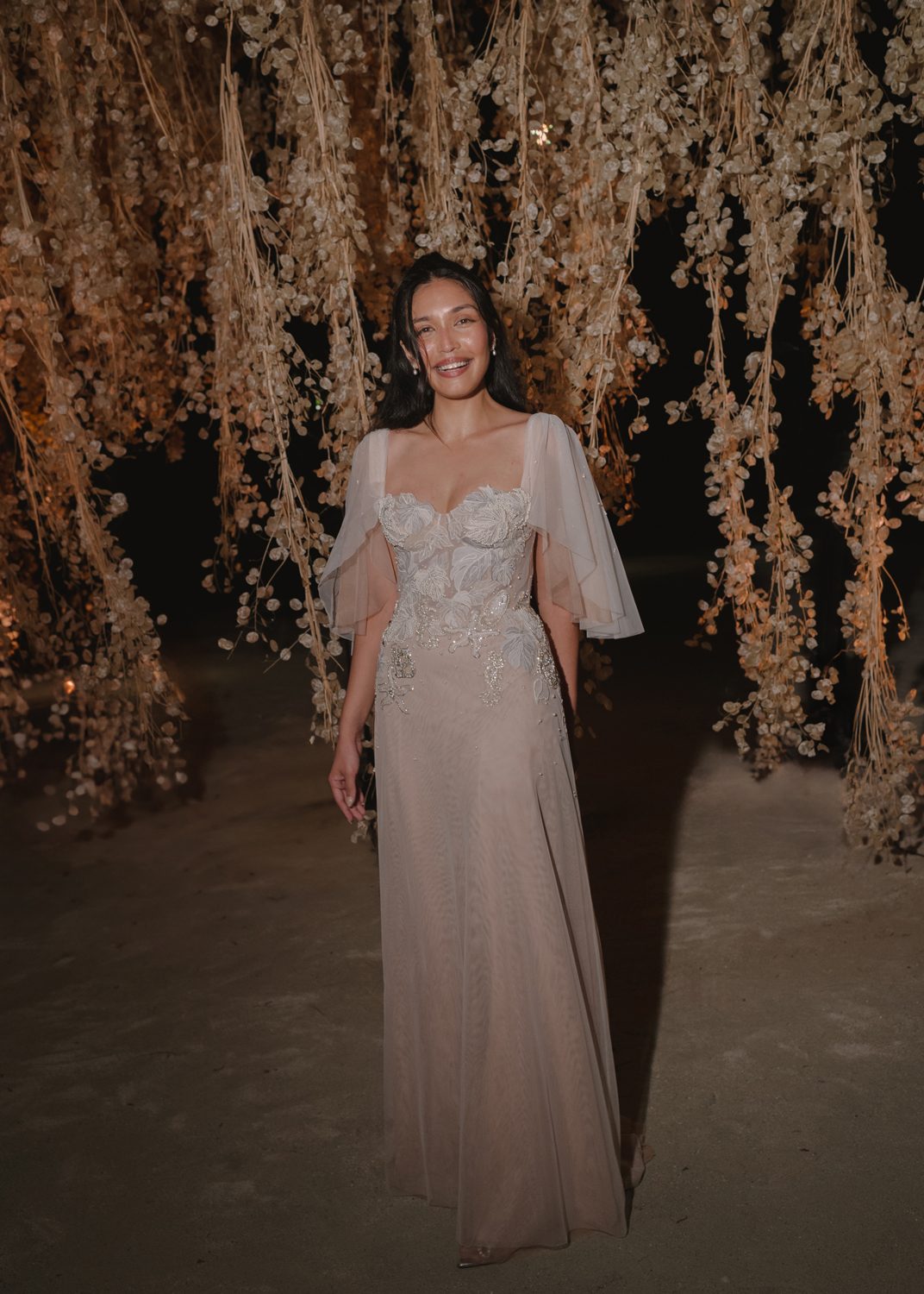 Hermione de Paula bride Manisha wearing a couture Monstera Celestial Seascape hand-embroidered wedding gown, as seen in Vogue - photo 1
