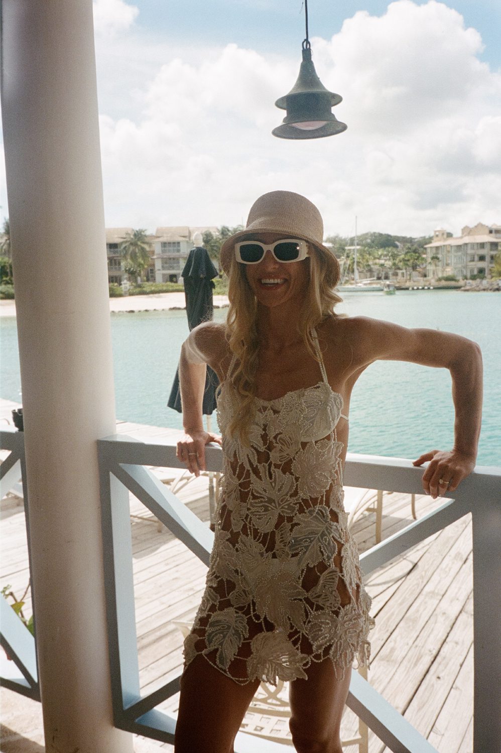 Hermione de Paula bride Pia wearing a custom Monstera pearl mini wedding dress with hand embroidery - photo 9
