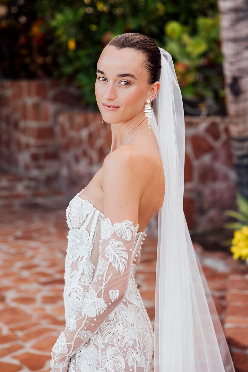 Hermione de Paula bride Sophia wearing the Monstera Eclipse couture wedding gown with Monstera vine gloves and a custom Monstera vine cathedral veil - photo 8